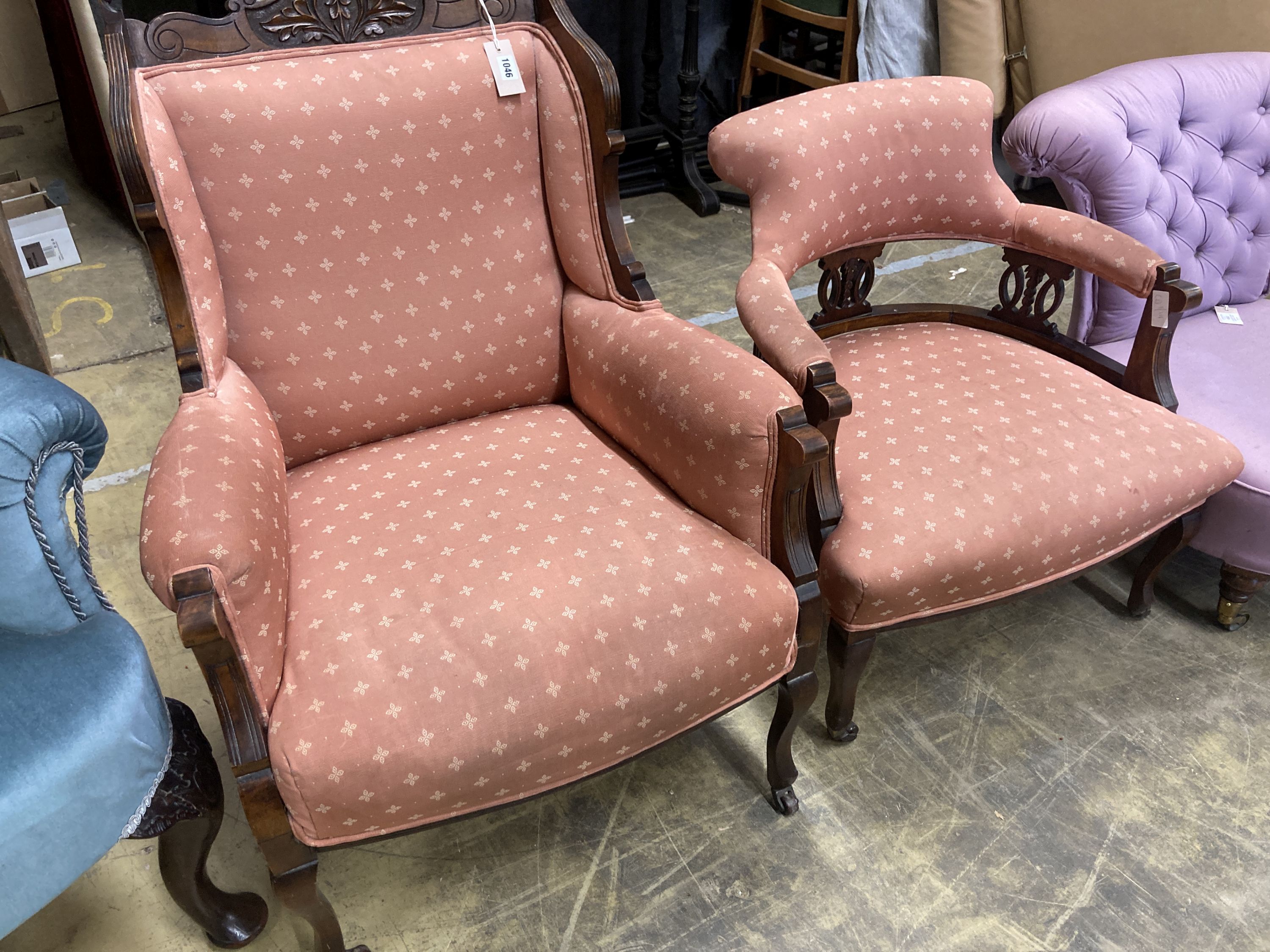 A late Victorian mahogany armchair together with a matching tub framed elbow chair